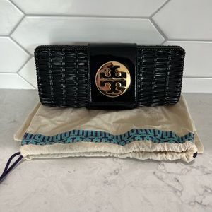 Tory Burch Rattan Clutch in a black with gold logo